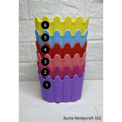 a colorful cup with a colorful top.