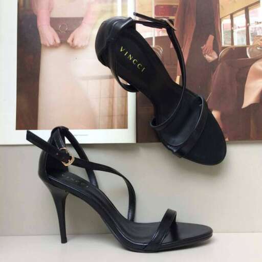 a pair of black high heeled shoes