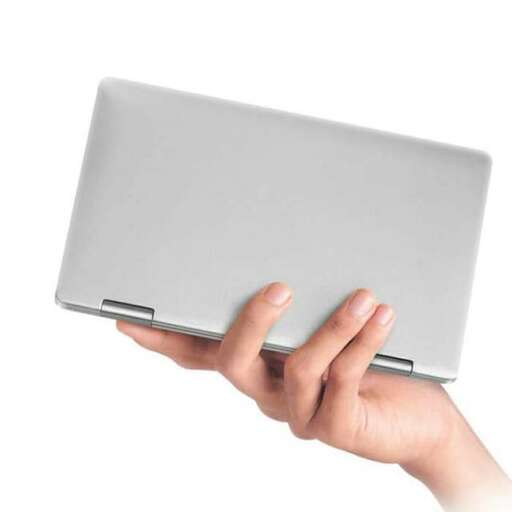 a hand holding a laptop computer with a white background