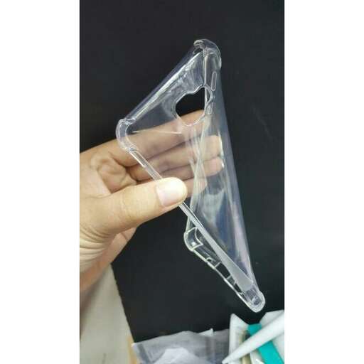 a plastic opening tool for a toothbrush.