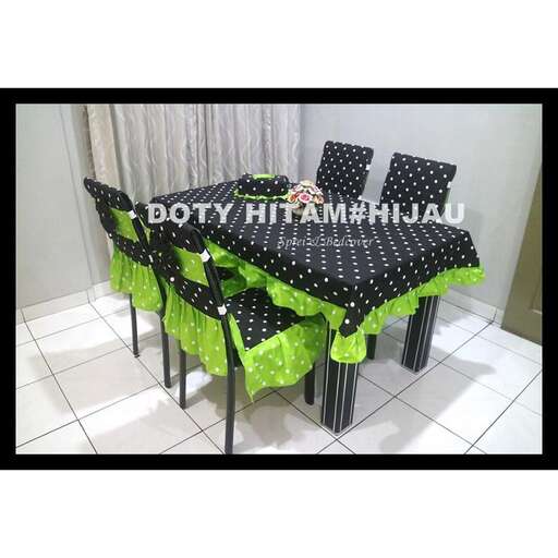 a table set with a black and white pattern.