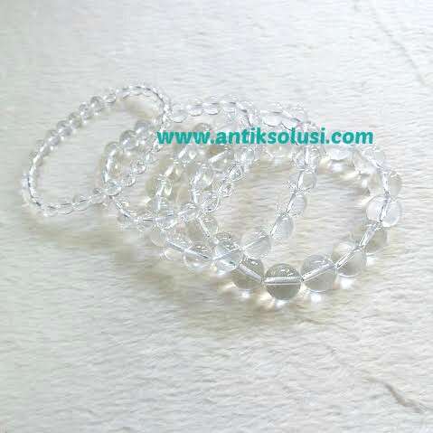 sterling silver bracelet with a pearl in the middle.