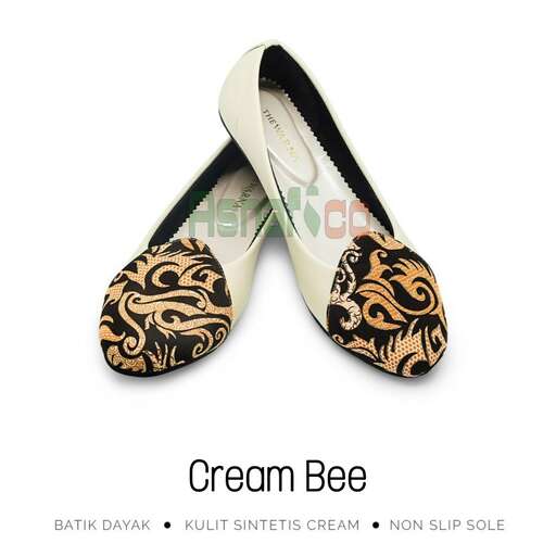 a pair of shoes with a design on the bottom