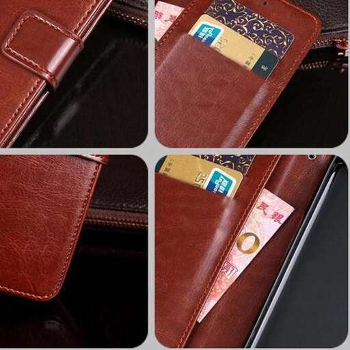 a brown leather wallet with a credit card in it.