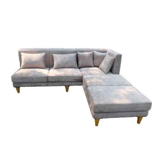a modern sofa with a curved seat and a matching ottoman.