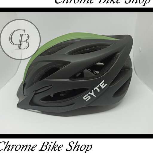 a helmet that is on a white surface.