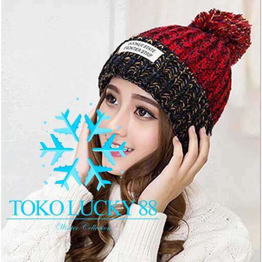 a girl in a knitted hat and a knitted hat.