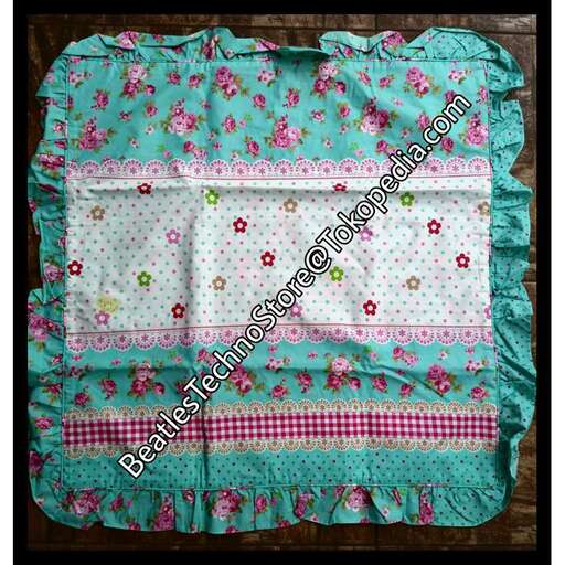 a quilted quilt with a flower pattern.