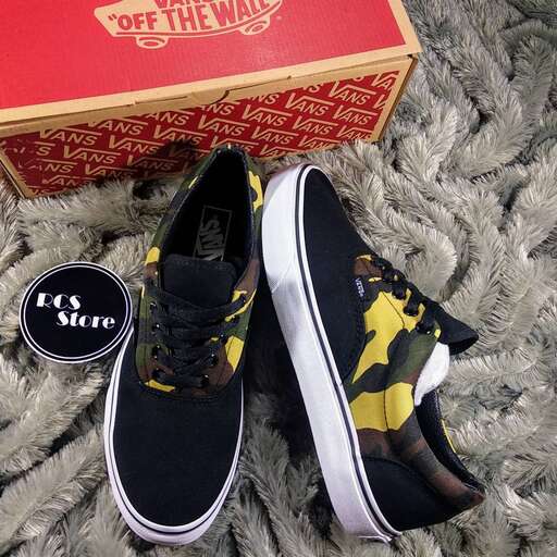 a pair of shoes with a box on the bottom.