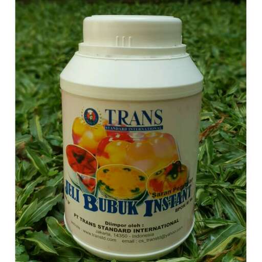 a bottle of fermented fruit in the garden.