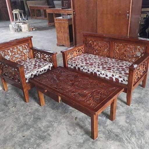a pair of chairs with a table and chairs.