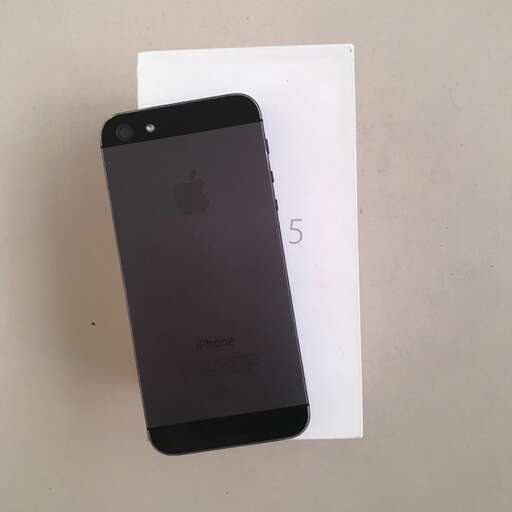 the iphone x is on a white piece of paper.
