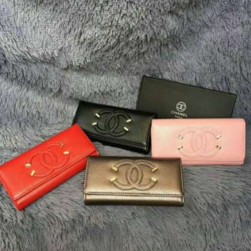 a selection of handbags, wallets and wallets