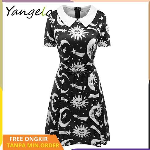 this dress is made from a vintage cotton and has a black and white print.
