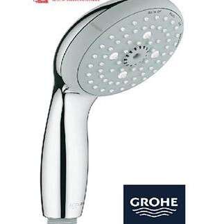 a shower head with a silver faucet.