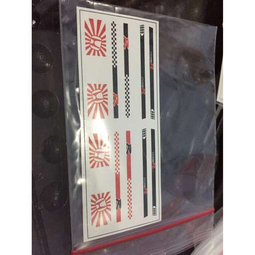 the red and black design on the front of the door is a product that is in the store.