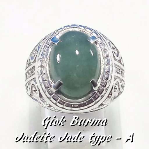 a beautiful emerald and diamond ring.