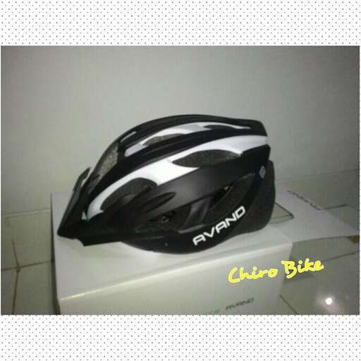 a helmet is sitting on a box.