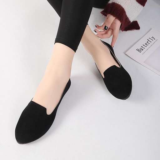 black suede shoes with a touch of red
