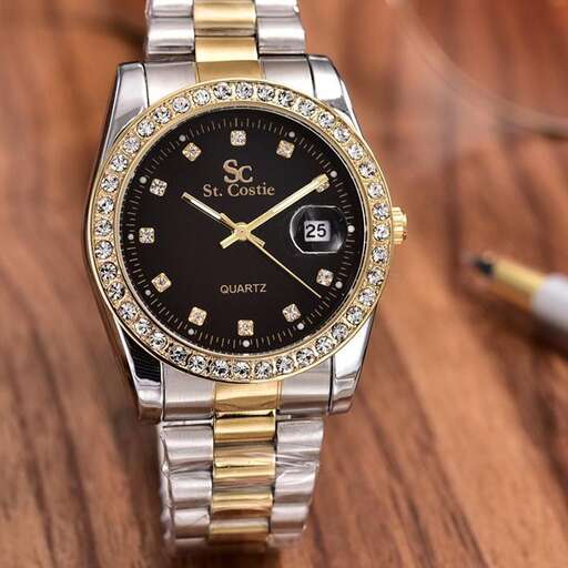 a watch with a gold band