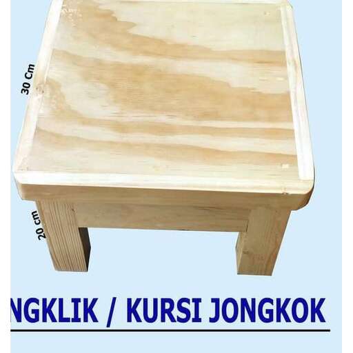a small wooden table with a large wooden top.