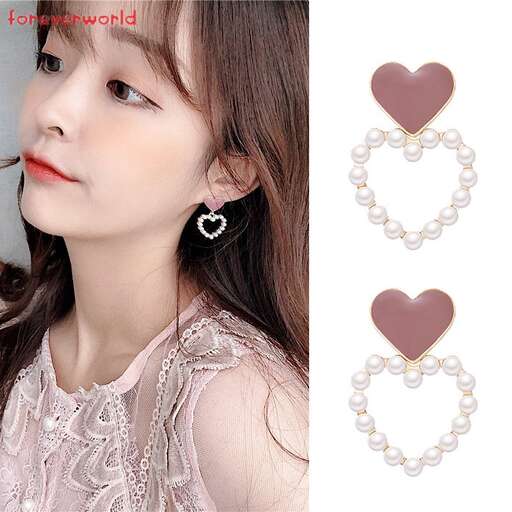 heart shaped earrings in sterling silver with a pearl necklace