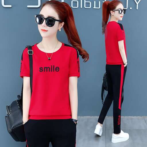 a model wearing a t - shirt and sunglasses