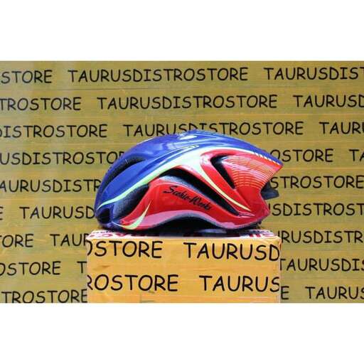 a bike helmet is displayed on a sign.