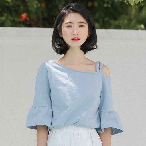 person in a blue off shoulder top
