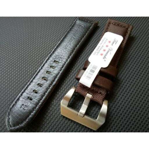 the strap is made of leather and is made from a genuine leather strap.