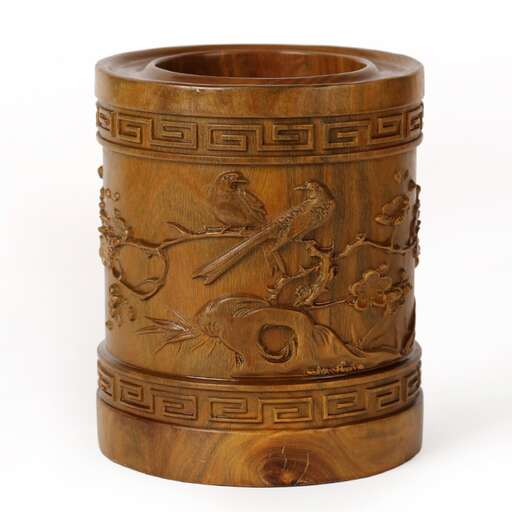 a large wooden box with a dragon and dragon.