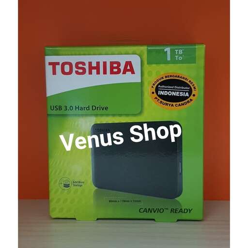 a brand new black and white product in a green box.