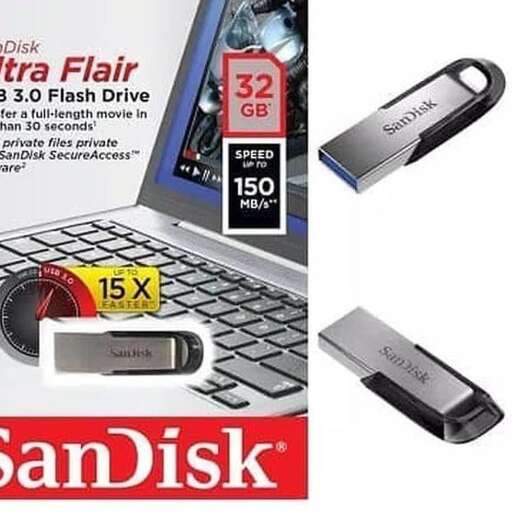 a computer with a battery charger next to it.