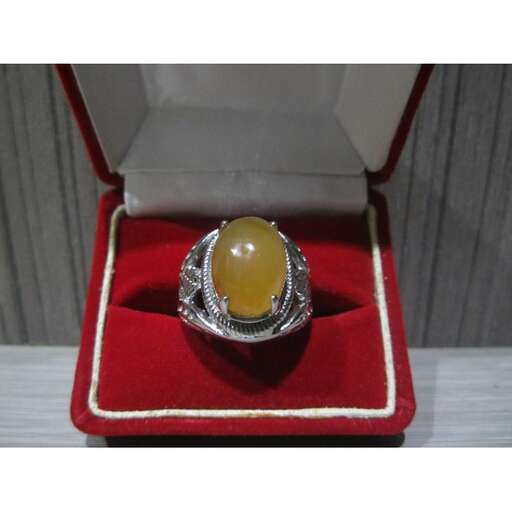 a ring made from a single yellow stone.