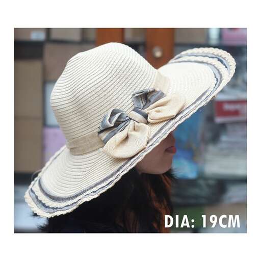 women's white floppy hat with a bow