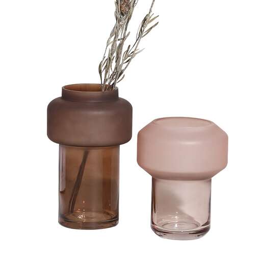 a flower in a jar with a flower in it.