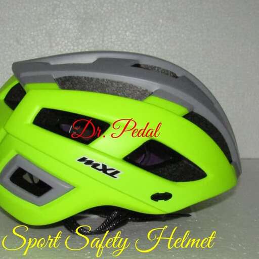 a helmet that is green and black