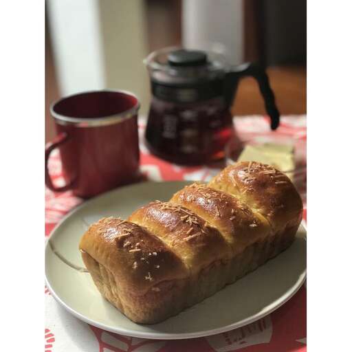 a plate with a piece of bread on it