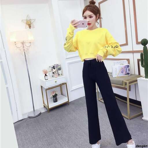 the yellow top with black pants