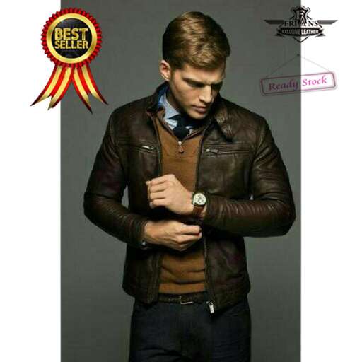 a man in a leather jacket and tie.