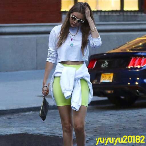 actor in a crop top and skirt