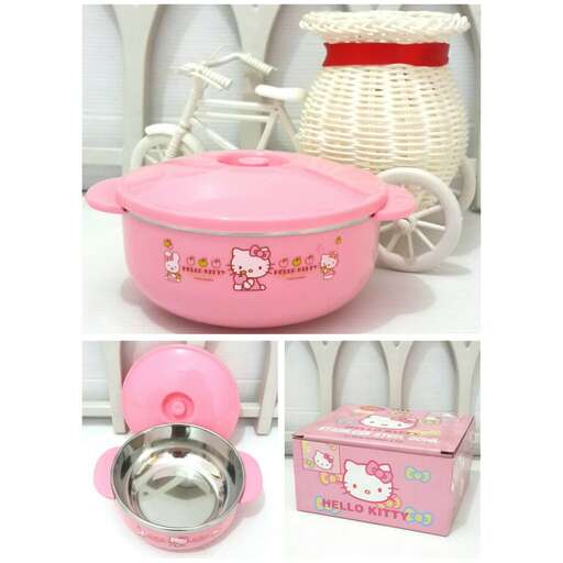 pink oven with a hello kitty on the front.
