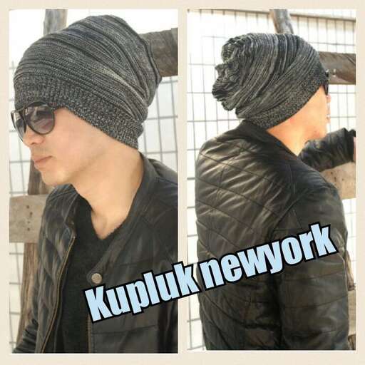 turban in black leather jacket