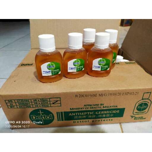the box is filled with honey and the bottles are in the box.