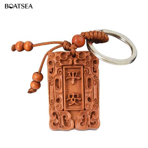 necklace with a carved face