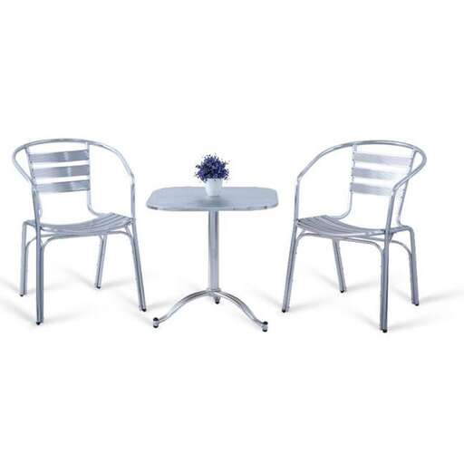 a pair of chairs with a table and chairs.