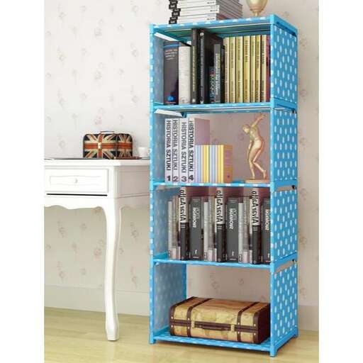 a blue bookcase with a white table and a white table