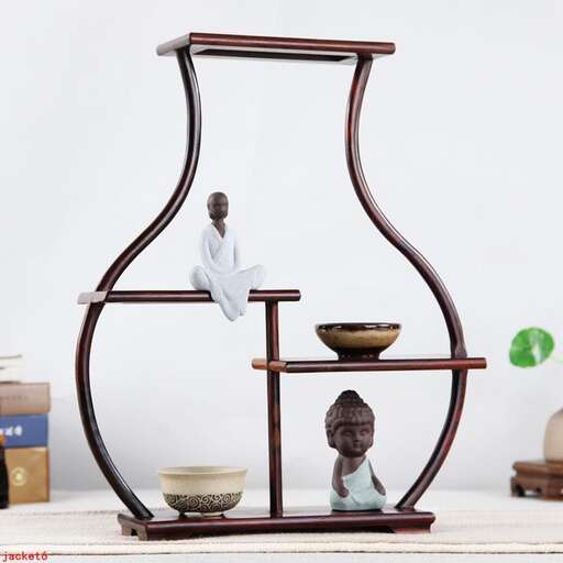 a large, tall, wooden vase with a vase on top of it.