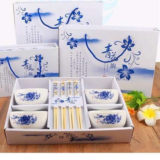 a set of chinese style blue and white china bowls and plates.
