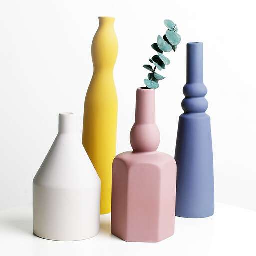 a group of vases with different colors.